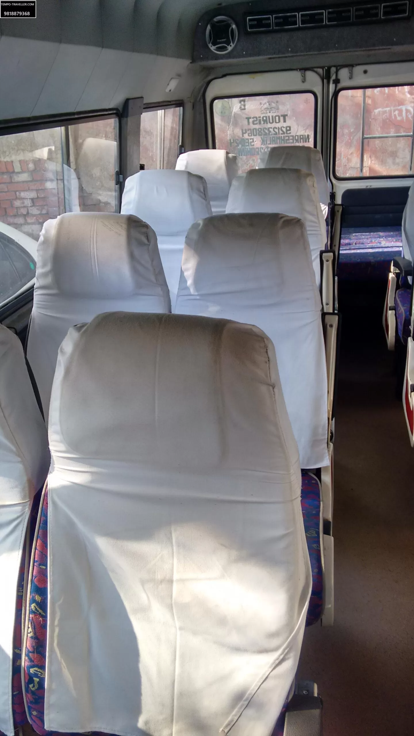 9 Seater Tempo Traveller